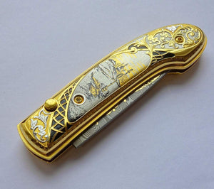 Couteau de forge en acier damas et or - ForgeOrigine