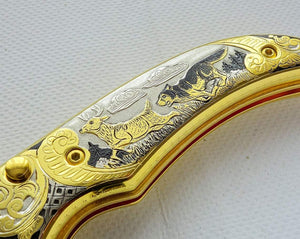 Couteau de poche en plaqué or